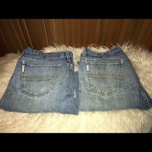 2 pairs of Cinch Jeans